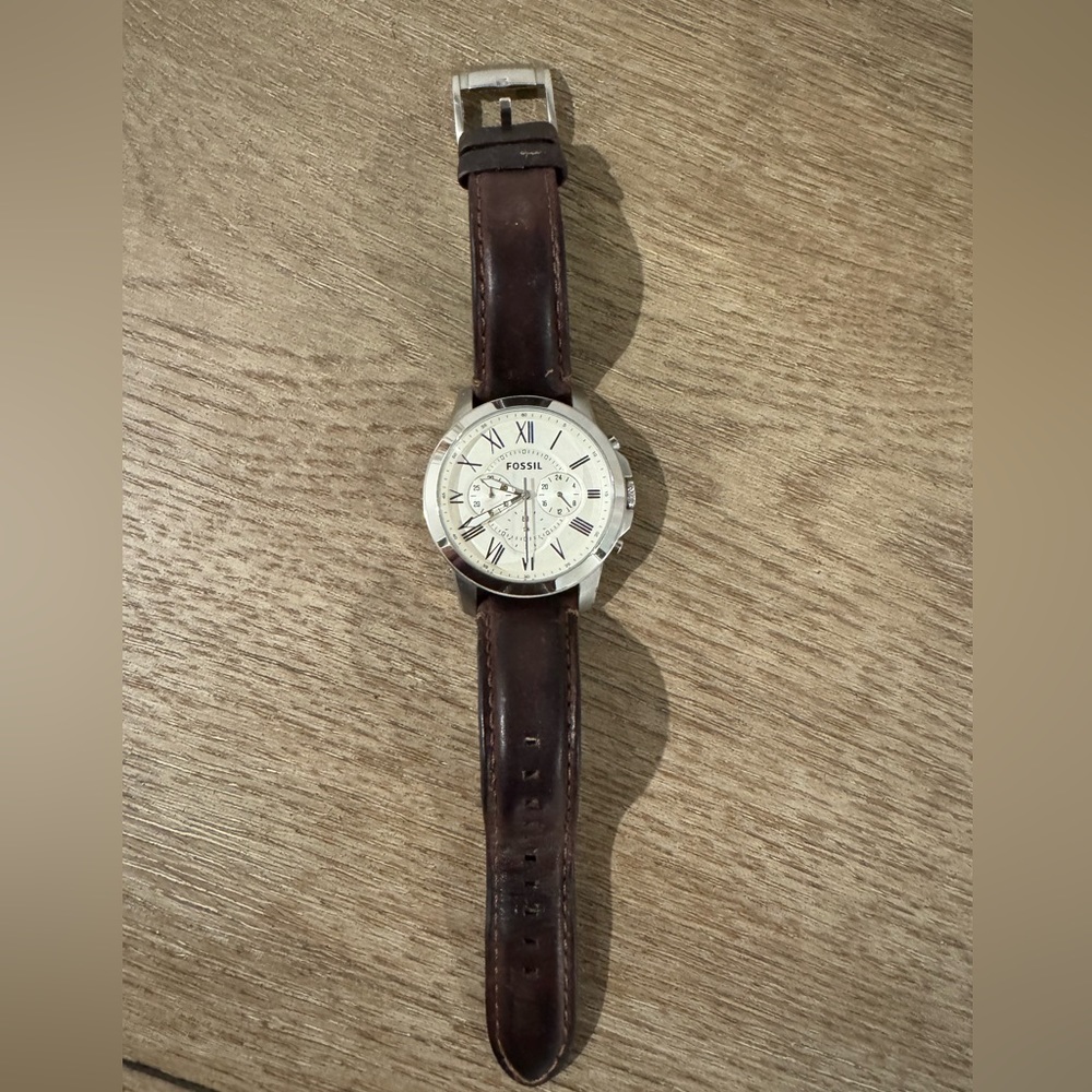 Men’s brown faucet watch